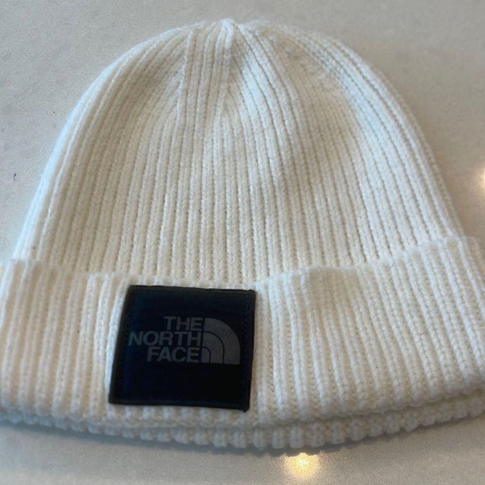 The North Face Cream Ribbed Cuff Beanie with Black Logo Patch